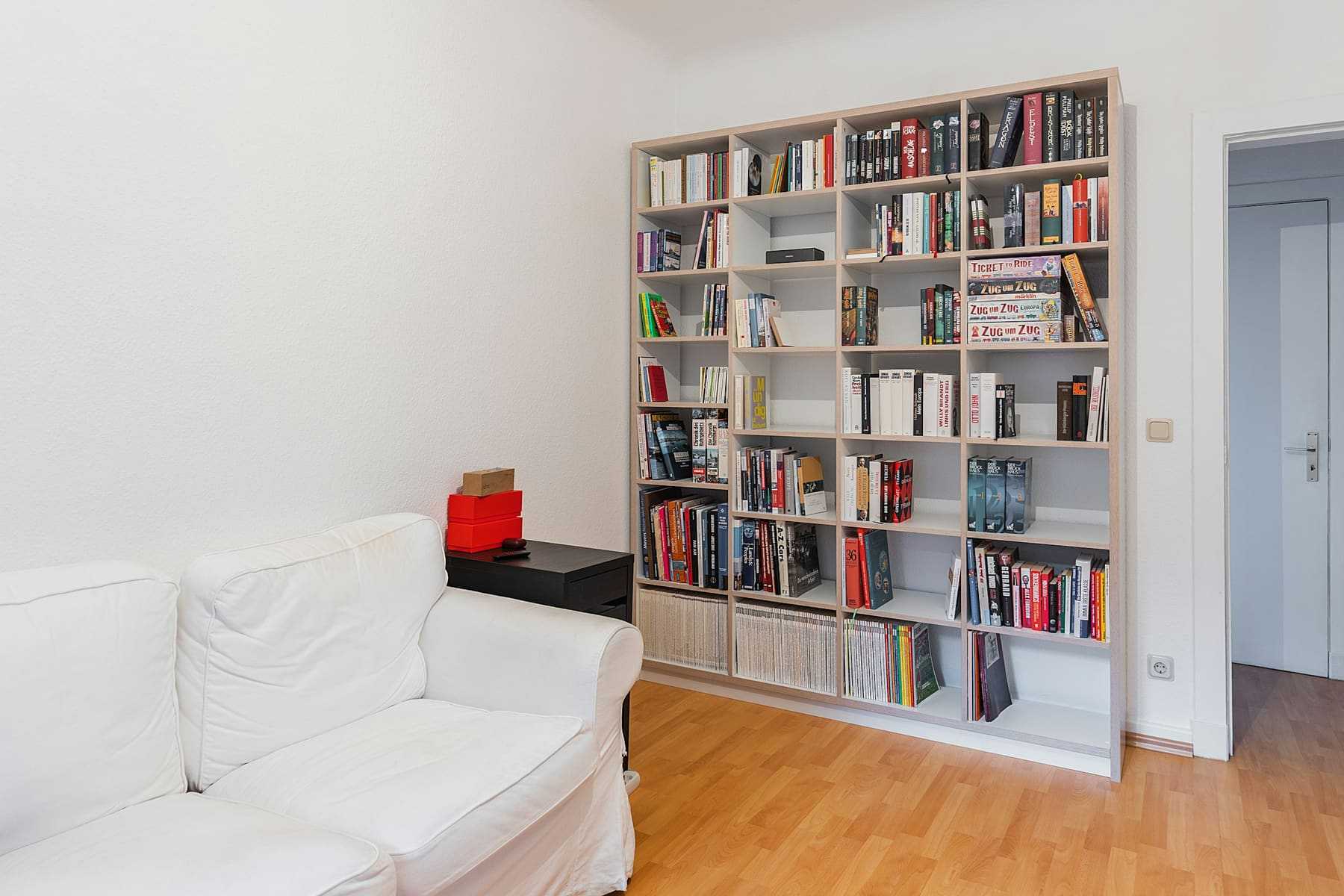 Floor-to-ceiling shelving in a living room