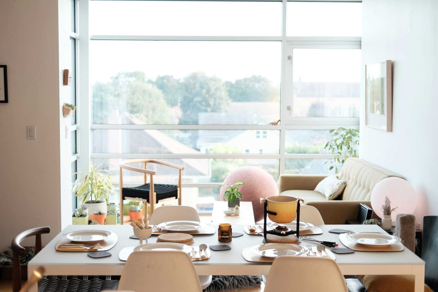 A bright, freshly finished flat with a dining table